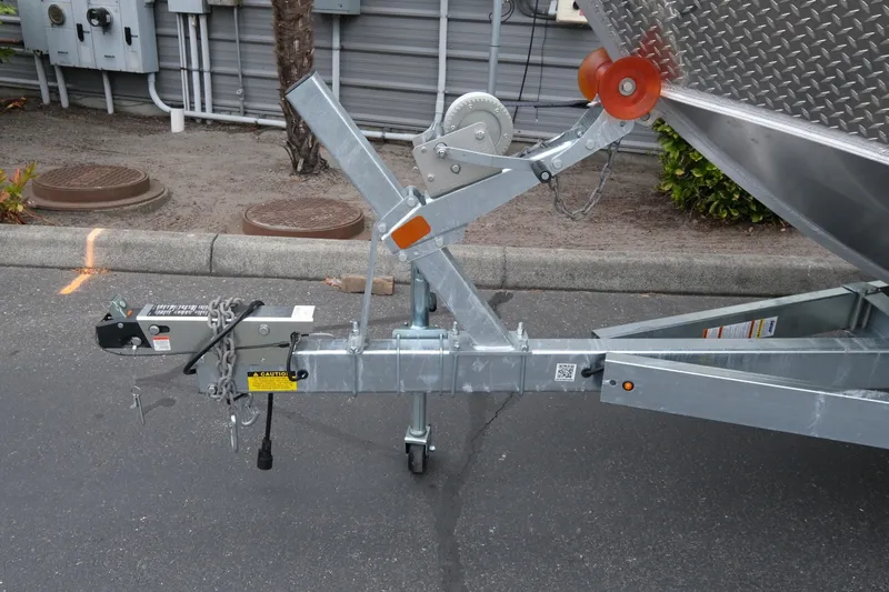 Slide: The Image of Trailer hitch of 2023 Hewescraft 200 ProV ET boat, parked on asphalt. - 16