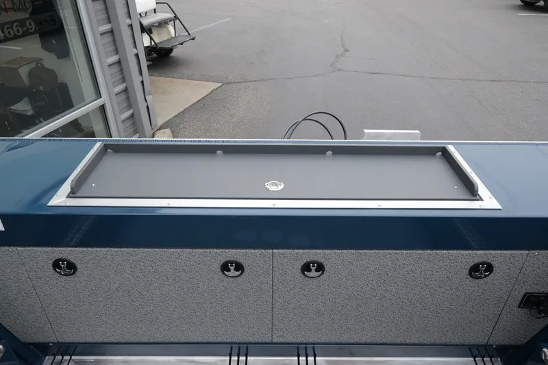 Slide: The Image of 2023 Hewescraft 200 ProV ET boat deck with storage compartments and sleek design. - 15