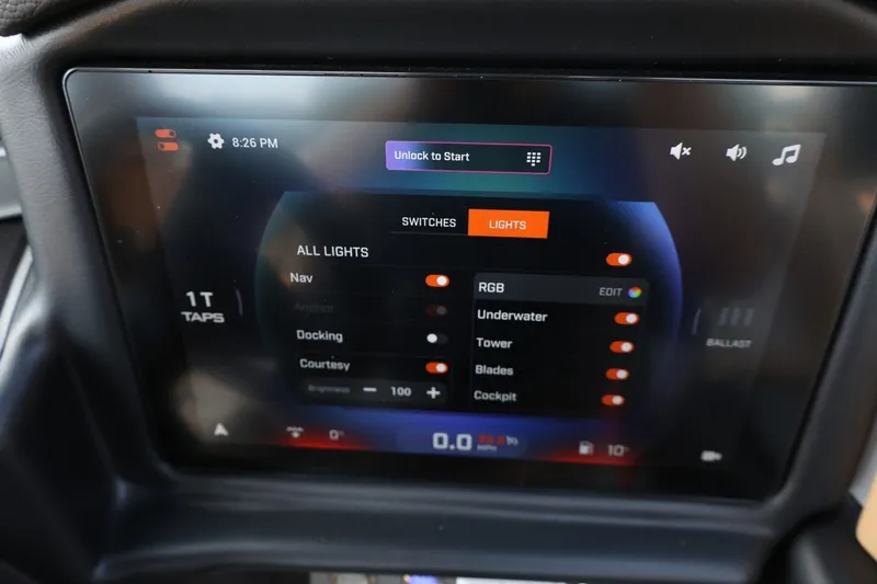 Slide: The Image of The image shows a modern touchscreen display in a boat, displaying various light controls. - 41