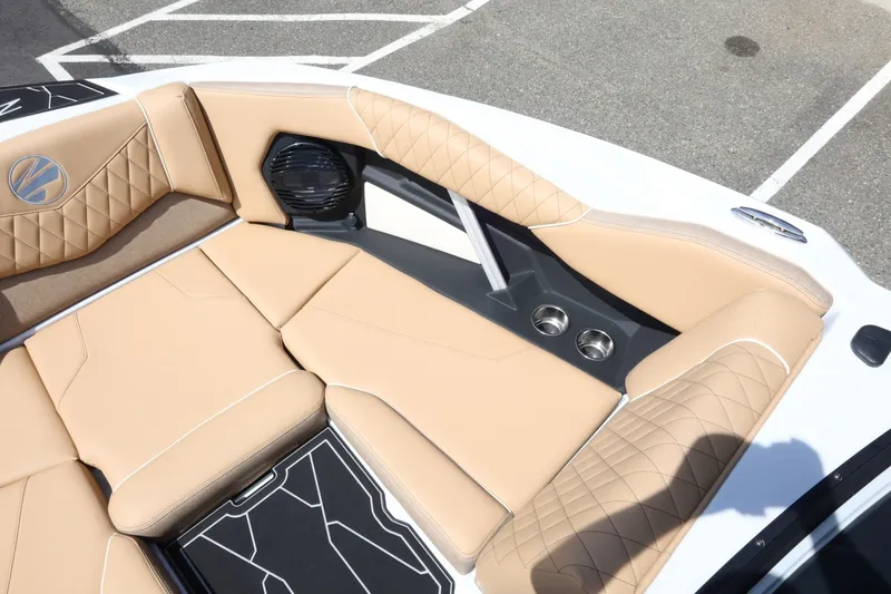 Slide: The Image of Interior of a Tigé Z3 boat with beige upholstery and speakers. - 26