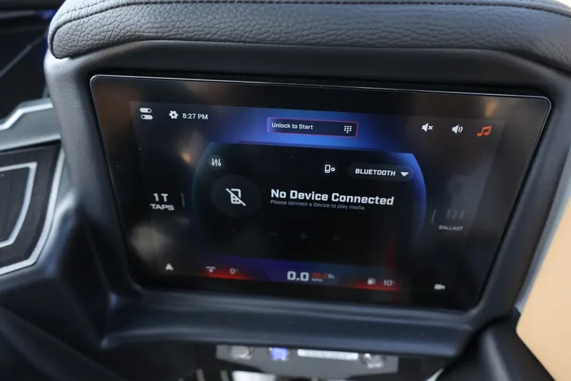 Slide: The Image of The image shows a modern boat dashboard with a touchscreen display indicating Bluetooth connectivity. - 45