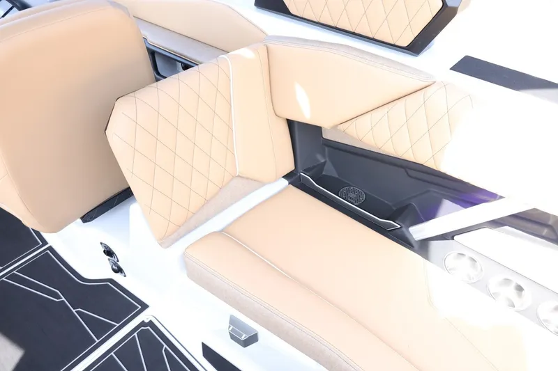 Slide: The Image of The 2027 Tigé Z3 features luxurious beige upholstery with a quilted pattern and modern details. - 23