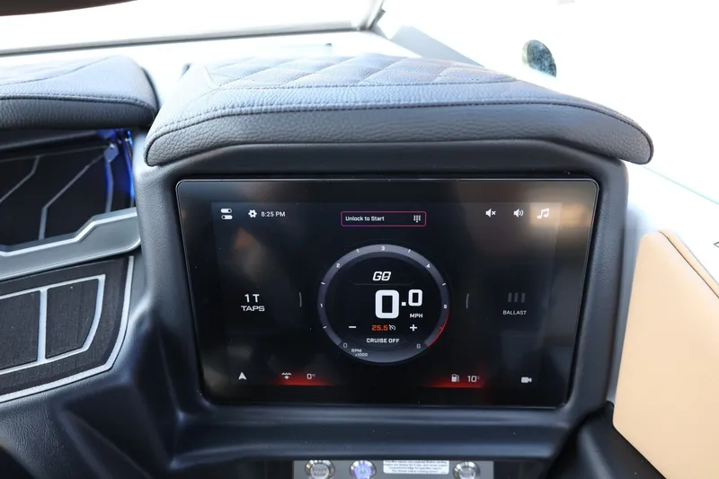 Slide: The Image of The image shows the dashboard of a 2027 Tigé Z3 with a digital display. - 38