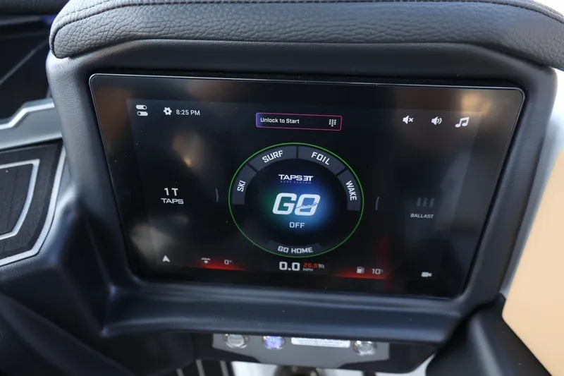 Slide: The Image of The image shows a modern boat dashboard with a digital display and various control options. - 39