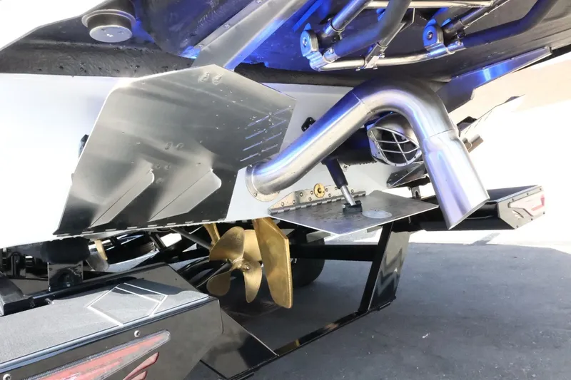 Slide: The Image of Close-up of a Tigé Z3 boat's stern with propeller and exhaust. - 15