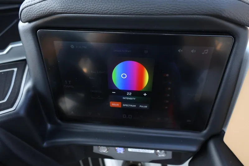 Slide: The Image of A modern control display with a color wheel for adjusting lighting intensity. - 42