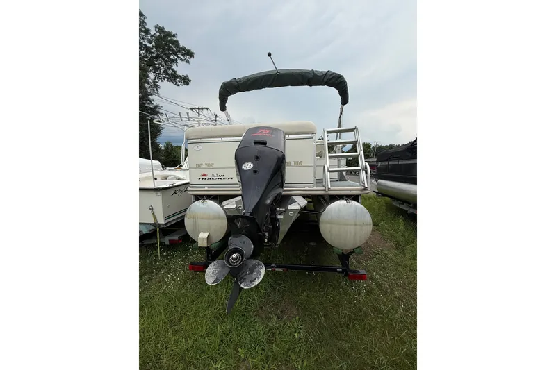 Slide: The Image of 2004 Sun Tracker Party Barge 22 Regency Edition pontoon boat, rear view with motor. - 15
