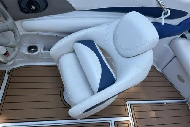 Slide: The Image of Captain's chair on 2008 Crownline 200 LS boat with teak-style flooring. - 10