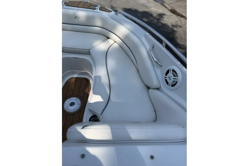 Slide: The Image of 2008 Crownline 200 LS boat interior with white seating and wood accents. - 17