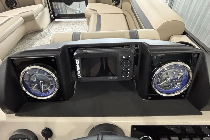 Slide: The Image of Dashboard of 2027 Premier 220 Sunscape RL - CL with Lowrance display and gauges. - 20