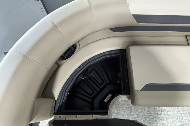 Slide: The Image of Interior seating of 2027 Premier 220 Sunscape RL - CL boat, featuring beige upholstery. - 9
