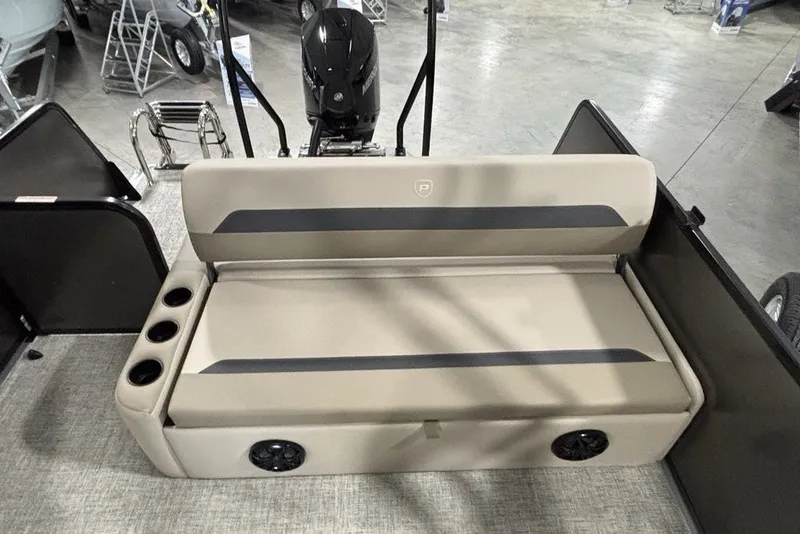 Slide: The Image of 2027 Premier 220 Sunscape RL - CL boat interior with beige seating and cup holders. - 19