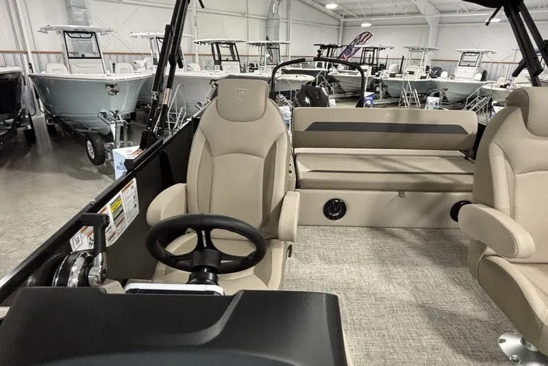Slide: The Image of Interior of 2027 Premier 220 Sunscape RL - CL boat in showroom setting. - 17