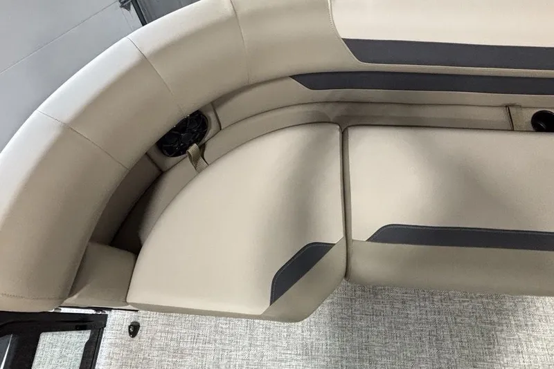 Slide: The Image of Luxurious seating on 2027 Premier 220 Sunscape RL - CL boat, featuring beige upholstery. - 11