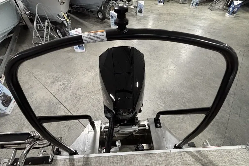Slide: The Image of Rear view of 2027 Premier 220 Sunscape RL - CL boat engine in showroom. - 21