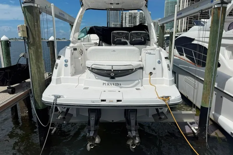 Slide: The Image of 2021 Monterey 355 Sport Yacht docked, rear view, showcasing sleek design and modern features. - 18