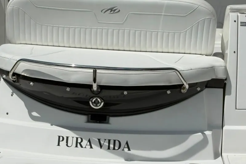Slide: The Image of 2021 Monterey 355 Sport Yacht with "Pura Vida" text on the rear seating area. - 14