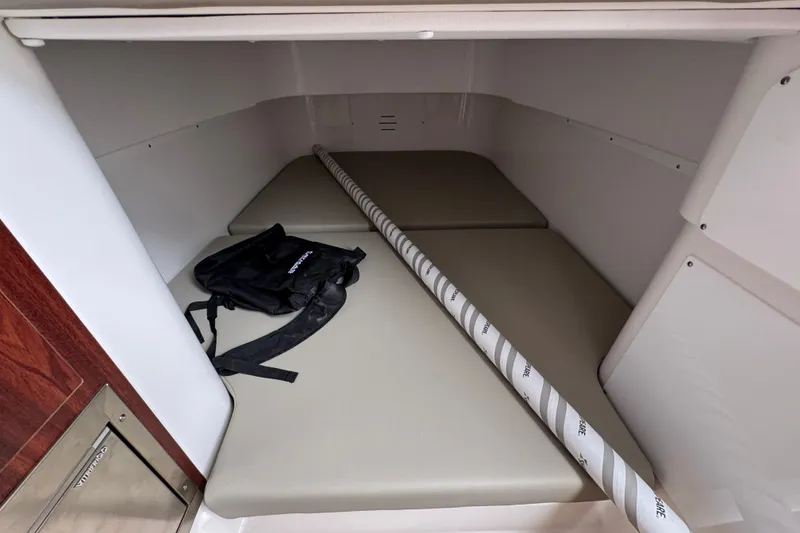 Slide: The Image of Interior cabin of 2027 Caymas 401 DR boat with seating and storage. - 33