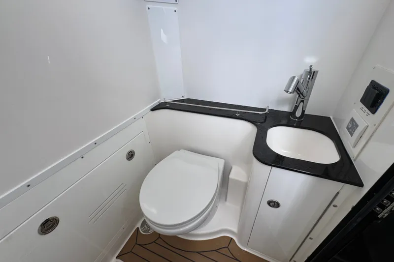 Slide: The Image of Modern bathroom in 2027 Caymas 401 DR boat with sleek sink and toilet design. - 35