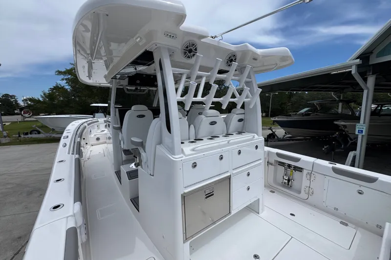Slide: The Image of 2027 Caymas 401 DR boat interior with seating and storage, showcasing modern design and functionality. - 47