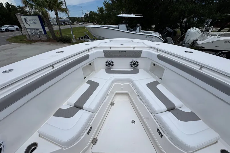 Slide: The Image of 2027 Caymas 401 DR boat interior with spacious seating and modern design. - 21