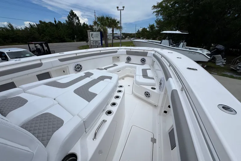Slide: The Image of Luxurious 2027 Caymas 401 DR boat interior with plush seating and modern design. - 20