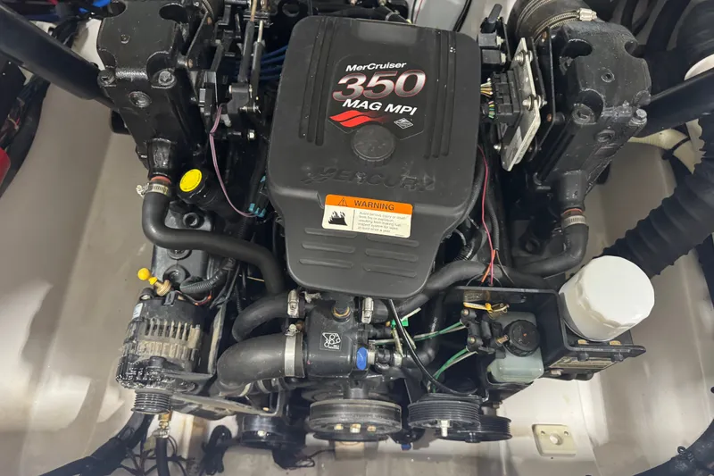 Slide: The Image of Engine of a 2005 Four Winns 250 Horizon boat with MerCruiser 350 MAG MPI. - 15