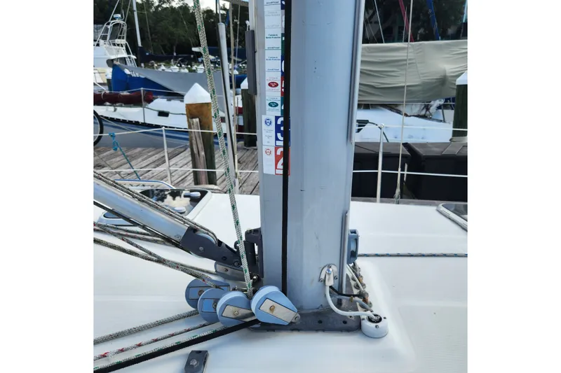 Slide: The Image of Close-up of Beneteau Oceanis 411 Celebration sailboat mast and rigging, docked at marina. - 11