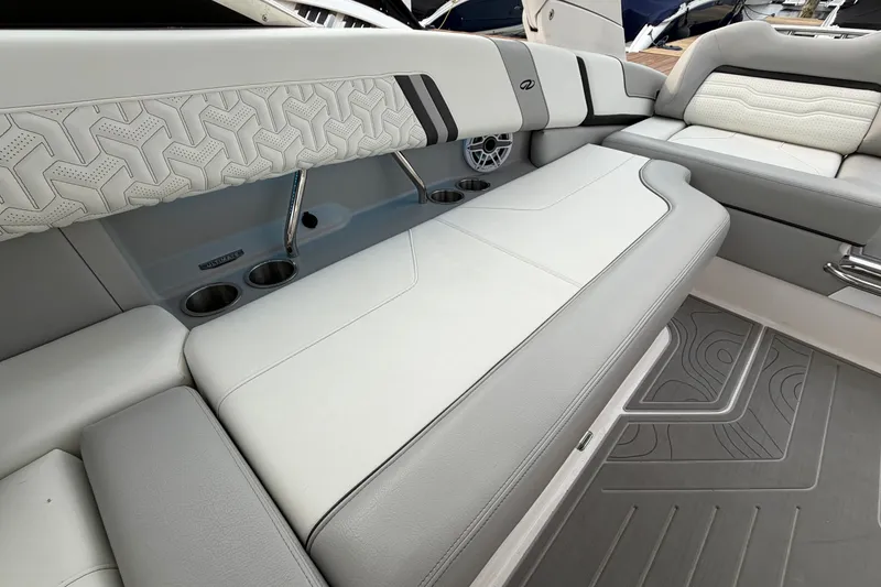 Slide: The Image of Luxurious interior seating of the 2024 Regal LS9 boat, featuring elegant design and comfort. - 16
