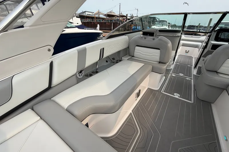 Slide: The Image of Luxurious interior of 2024 Regal LS9 boat with sleek seating and modern design. - 12