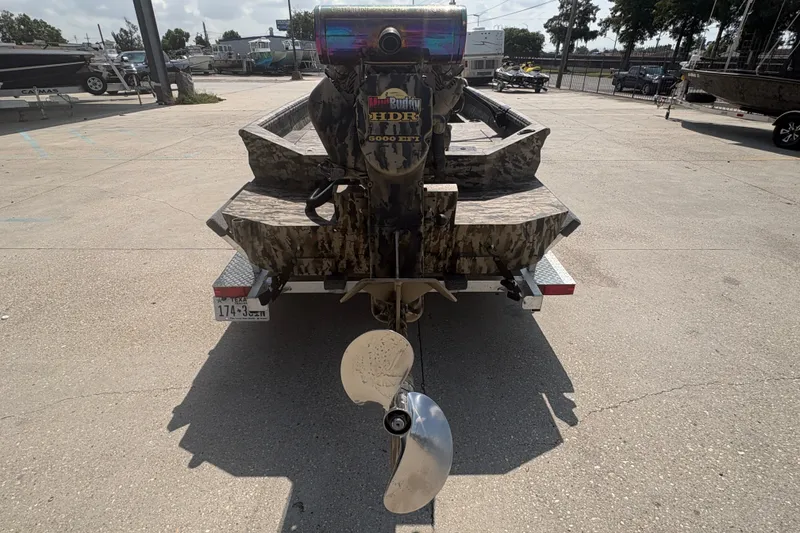 Slide: The Image of 2026 Excel 1751 Shallow Water F4 boat with camo design and outboard motor. - 6