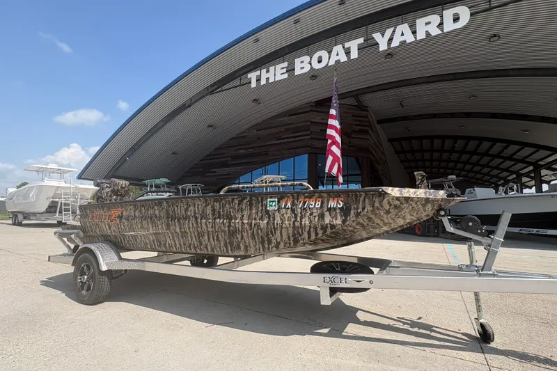 Slide: The Image of 2026 Excel 1751 Shallow Water F4 boat on trailer at The Boat Yard. - 2