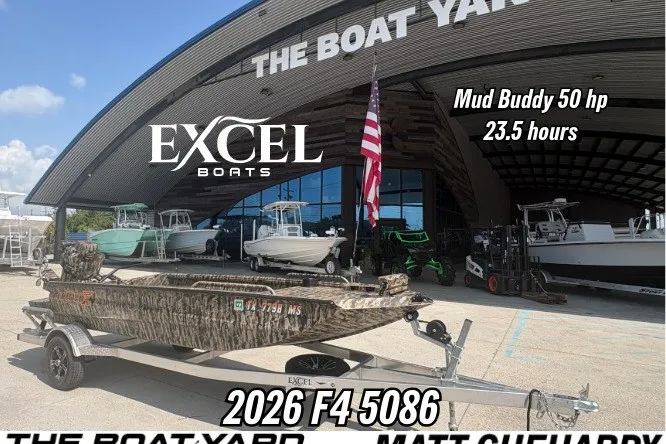 The Image of 2026 Excel 1751 Shallow Water F4 boat at dealership, featuring Mud Buddy 50 hp engine. - 1