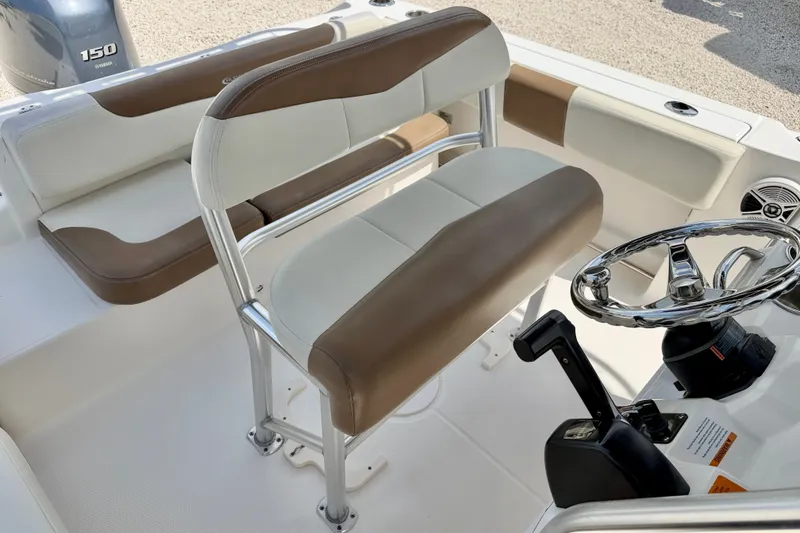 Slide: The Image of 2017 Robalo R200 Center Console boat interior with steering wheel and seating. - 15
