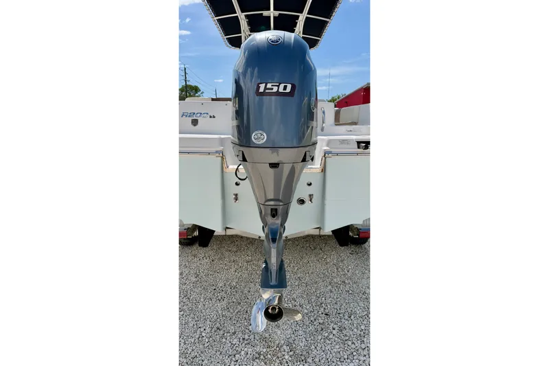 Slide: The Image of 2017 Robalo R200 Center Console with 150 HP outboard motor, rear view. - 29