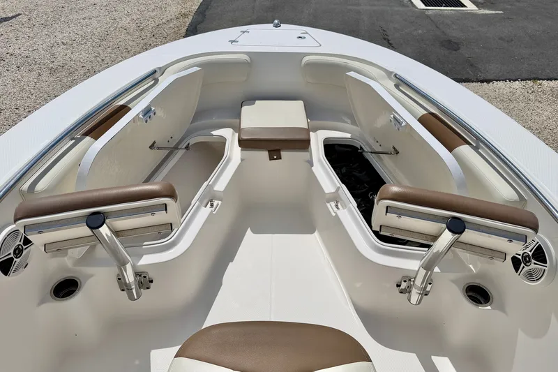 Slide: The Image of 2017 Robalo R200 Center Console boat interior with open storage compartments and seating. - 13
