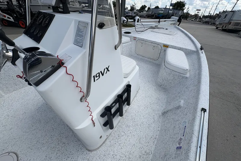Slide: The Image of 2008 Kenner 19 VX boat interior with steering console and seating. - 18