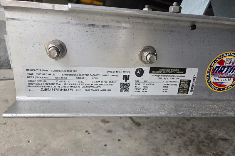 Slide: The Image of Label on a 2025 Florida Custom Boats 17 trailer, detailing specifications and compliance. - 21