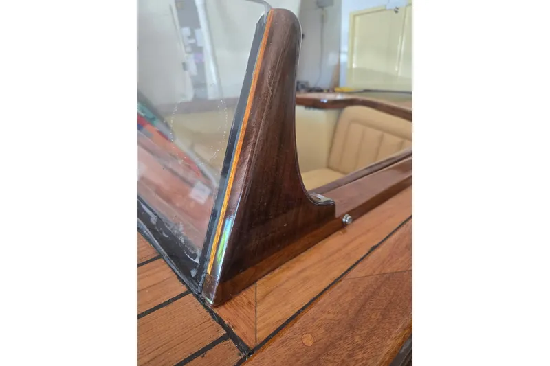 Slide: The Image of Wooden interior detail of a 2025 Custom Line 17 boat, featuring elegant craftsmanship. - 17
