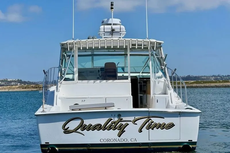 Slide: The Image of 1998 Viking 43 Open yacht named "Quality Time" docked in Coronado, CA. - 2