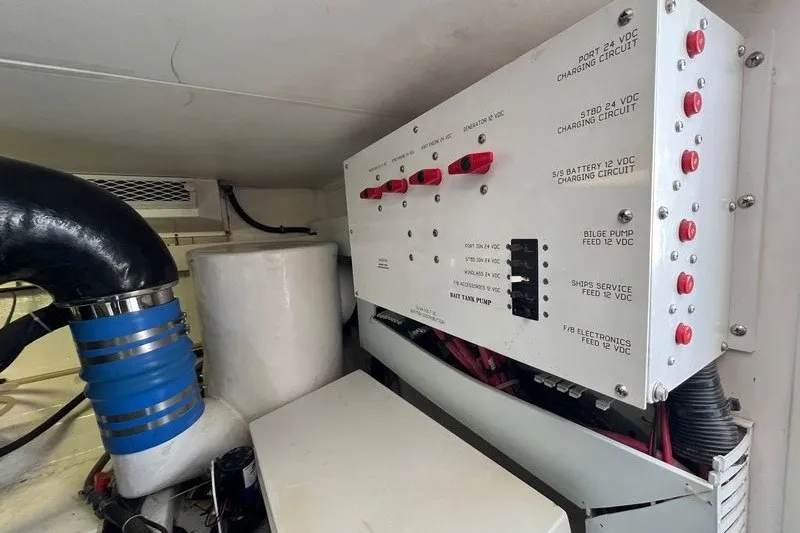 Slide: The Image of Electrical panel in a 1998 Viking 43 Open boat engine room. - 18