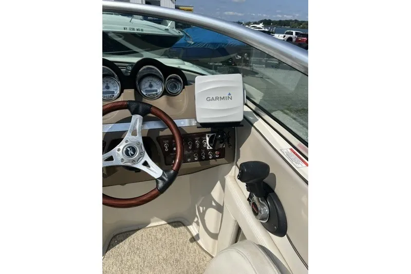 Slide: The Image of Steering console of a 2010 Sea Ray 260 Sundeck with Garmin navigation system. - 18