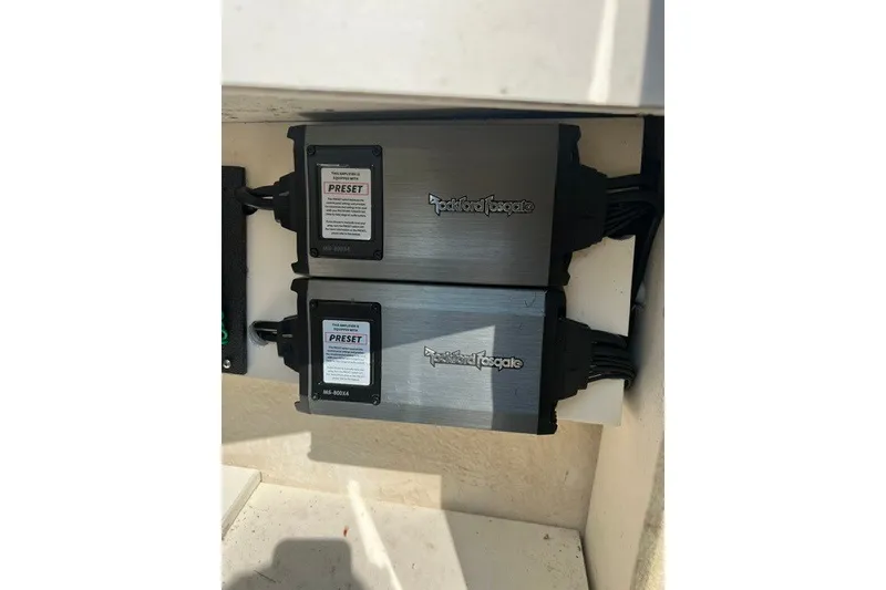 Slide: The Image of Rockford Fosgate amplifiers installed on a 2010 Sea Ray 260 Sundeck boat. - 22