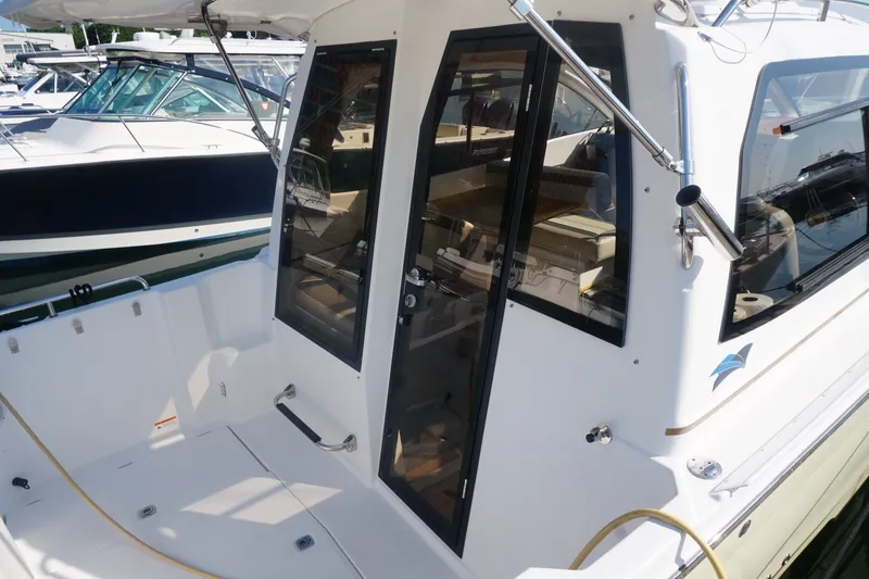 Slide: The Image of 2018 Cutwater C-24 boat with sleek design and spacious cockpit area. - 22
