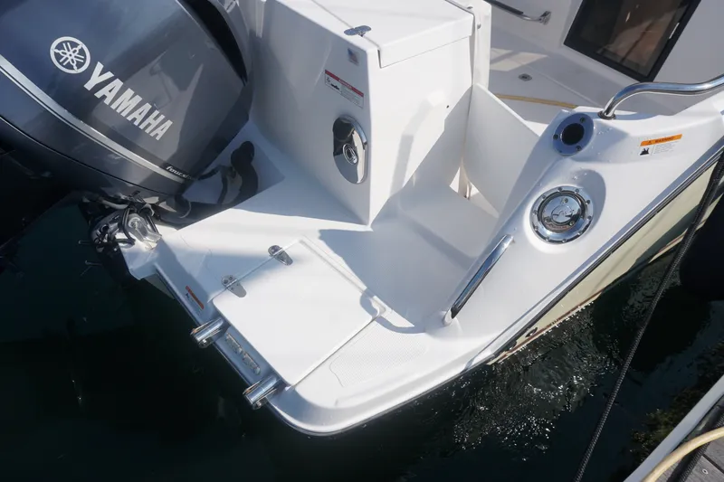 Slide: The Image of 2018 Cutwater C-24 boat with Yamaha outboard motor, featuring a sleek white deck. - 41