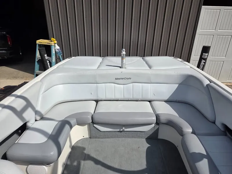 Slide: The Image of The image shows the cockpit of a 2003 MasterCraft X-30 with gray upholstery. - 5
