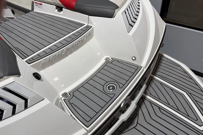 Slide: The Image of 2019 Nautique Super Air Nautique G25 boat deck with gray non-slip surface. - 32