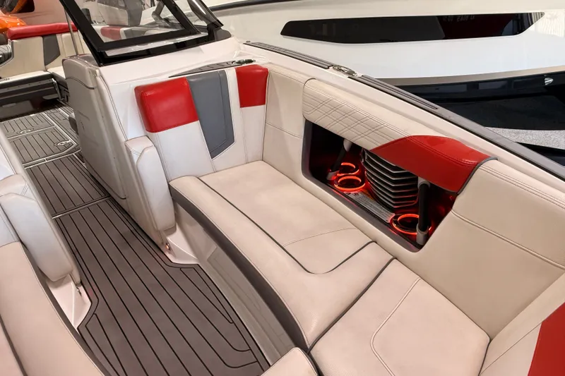Slide: The Image of Interior of 2019 Nautique Super Air Nautique G25 with red and white seating. - 17