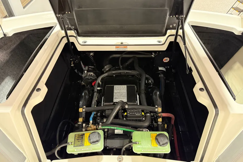 Slide: The Image of 2019 Nautique Super Air Nautique G25 engine compartment showcasing PCM XR7 engine. - 25
