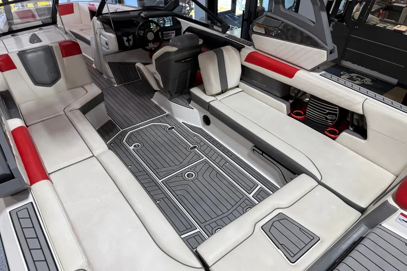 Slide: The Image of 2019 Nautique Super Air Nautique G25 interior with sleek seating and modern dashboard design. - 40